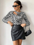  | SHEIN Essnce Zebra Striped Cut Out Tee | Top | Shein | OneHub