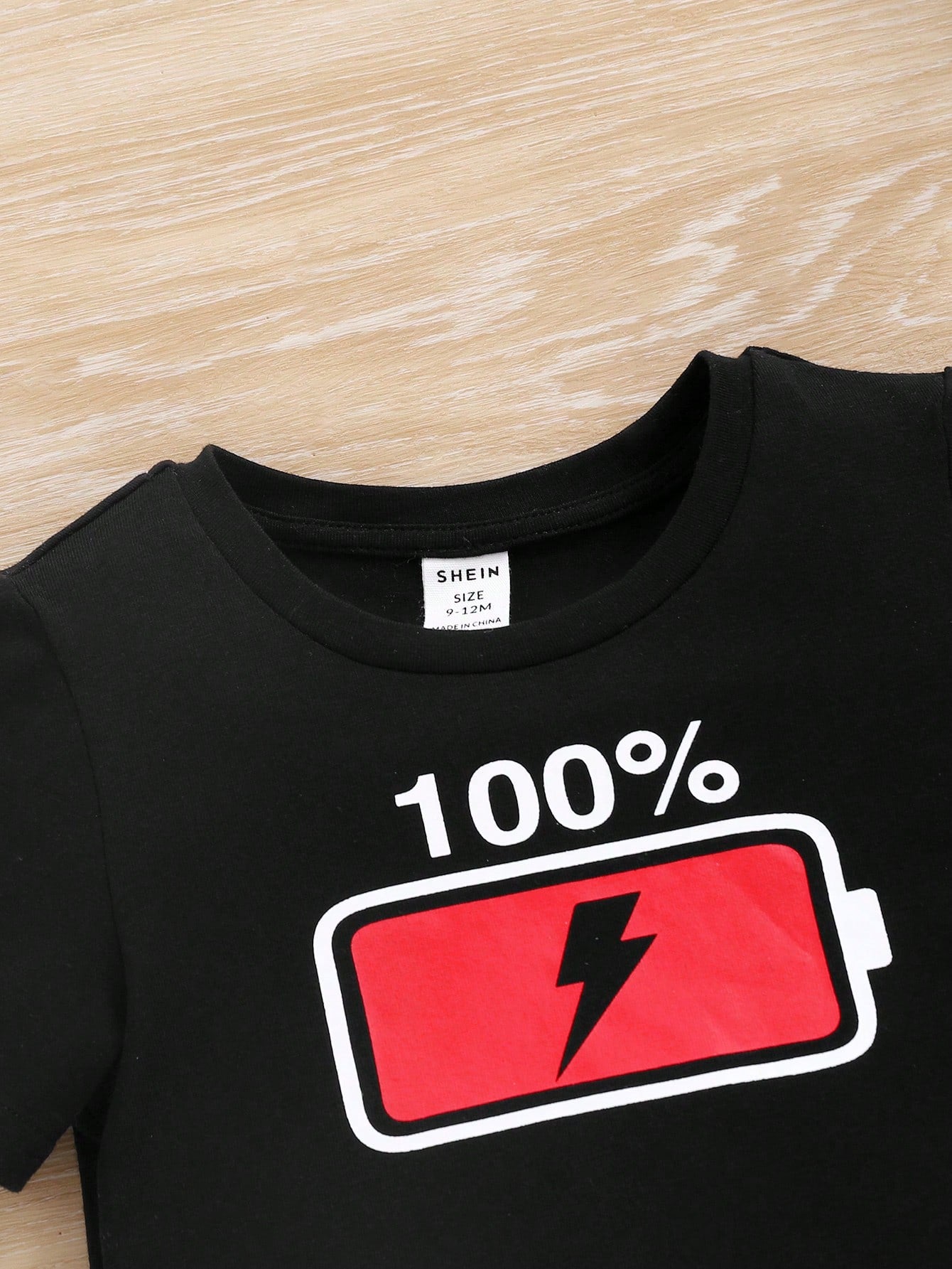 SHEIN Unisex Baby Fun Battery Pattern T-Shirt Top And Plaid Shorts Pajama Set, 2pcs